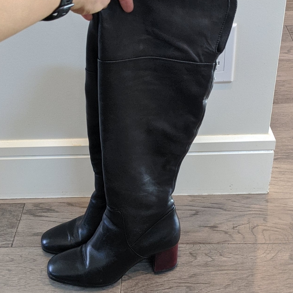 Knee high black leather heels